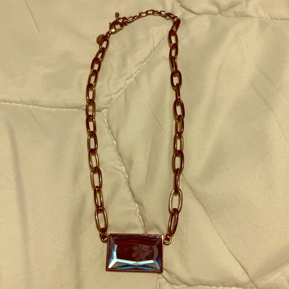 Black necklace with blue pendant